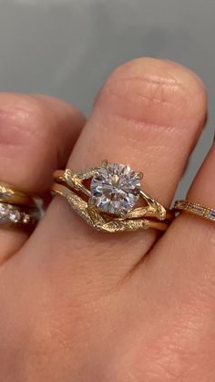 A matching wedding set featuring our Pembroke - a nature inspired solitaire engagement ring with leaf details and a split shank band. She's paired with our Vennie, a nature inspired contoured wedding band with leaf details. Drop-down diamond options represent our recommended grade, which maximizes size for value, while maintaining eye-perfect clarity and giving you a colorless look. For other diamond options, see our Shop Diamonds tab or speak to one of our design consultants. Rings in this set can be purchased separately by visiting the individual product pages. Pembroke setting only cost below: 14k white, rose, or yellow gold setting $1,190 18k white, rose, or yellow gold setting $1,350 Platinum Setting: $1,590 Vennie cost below: 14k white, rose, or yellow gold setting $970 18k white, ro Flower Engraved Engagement Ring, Traditional Gold Wedding Ring, Birthstone Engagement Rings August, Engagement Ring With Other Rings On Hand, Tree Branch Engagement Ring, Art Deco Band Ring, Multi Color Engagement Rings, Northway Studio Ring, Wrap Diamond Ring