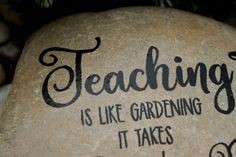 a rock that says teaching is like gardening it takes strength