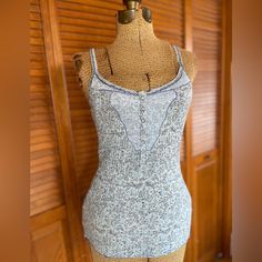 Vintage Rare Free People Ribbed Pointelle Henley Camisole In Indigo Floral Print With Lace Detail At The Neck And Snaps. Lace Trim Along The Neck And Spaghetti Straps. Slim Fit But Stretches Quite A Bit. Bust Stretches Up To 18” Approx. Absolutely Love This Style. New With Tags 100% Cotton Size Large Fitted Tank Tops For Day, Blue Fitted Camisole With Scoop Neck, Fitted Tank Strap Tops For Daywear, Fitted Tank Top For Daywear, Fitted Tops With Tank Straps For Daywear, Fitted Bohemian Pointelle Knit Top, Spring Pointelle Knit Cami Camisole, Henley With Lace Cami, Casual V-neck Pointelle Knit Tank Top