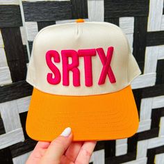 Looking for a way to add some personality to your outfit? Trucker hats are the perfect solution! With fun colors and embellishments, they'll help you stand out from the crowd. Plus, they're perfect for those days when you just can't be bothered to style your hair. Most importantly, they're super comfortable, so you can wear them all day long. Spring Orange Trucker Hat One Size, Adjustable Retro Orange Hat, Retro Adjustable Orange Hat, Fun Flat Bill Hats For Spring, Fun Spring Flat Bill Hats, Orange Snapback Trucker Hat For Spring, Spring Orange Snapback Trucker Hat, Trendy Orange Trucker Hat For Summer, Orange Trucker Cap For Spring