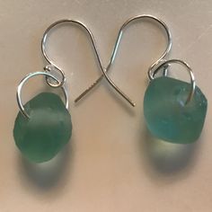 Aquamarine Green Sea Glass 11mm Rondels Sterling Silver Ear Hooks And Jump Rings Handcrafted By Pixie Life 1” Length Casual Beautiful Sea Green Comfortable Minimalist Design Boho Style Vacation Style Aesthetic Artsy Eclectic Streetwear Art To Wear Casual Boho Bohemian Handcrafted Handmade Earrings Hand Crafted Pixielife Pixie Life Girl Unique Work School Dressy Fall Summer Essentials Trendy Funky Green Indie 90’s Chic Colorful Sea Green Nature Millennial Minimalist Jewelry Aqua Aquamarine Blue G Everyday Round Glass Jewelry, Everyday Green Glass Jewelry, Blown Glass Jewelry, Nickel Free Glass Jewelry In Minimalist Style, Minimalist Nickel-free Glass Jewelry, Minimalist Glass Jewelry With Ear Wire, Everyday Silver Glass Jewelry, Nickel-free Teardrop Recycled Glass Jewelry, Nickel-free Round Recycled Glass Jewelry