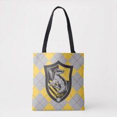 Harry Potter | Hufflepuff House Pride Crest Tote Bag #harrypotter #hogwarts #housecrest Paint Tote Bag, Hufflepuff Crest, Hufflepuff Pride, Hufflepuff House, Harry Potter Merchandise, Harry Potter Hufflepuff, Painted Tote, Hogwarts School, Wizarding World Of Harry Potter