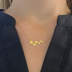 Tell her that she is the "star" of the show! Some women need to own their bright light and show the world that they are special and a star!The details for this beautiful necklace are listed below:Metal Quality: 14kt Yellow Gold Pendant Style: Attached Measurements of Pendant: 1 cm X 2.5 cm Chain Type: Cable Chain Length: Adjustable 16 in - 18 in Clasp: Lobster Clasp Chain Diameter: .9 mm Star-shaped Necklace For Anniversary, Star Cluster, Cluster Necklace, Star Jewelry, Yellow Gold Pendants, Custom Jewelry Design, Bright Light, Beautiful Necklace, Cable Chain