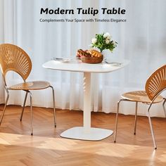 two chairs and a table in front of a window with the words modern tulip table complements your space with thinness elegance