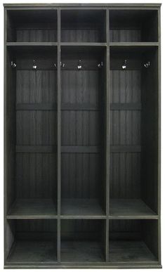 an empty bookcase with four shelves and three lights on each shelf, in front of a white background