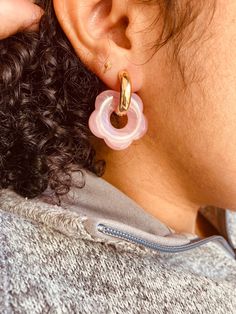 These earrings are a unique way to show off your style. These are flower -daisy inspired charms made with resin  that are paired with gold plated hoop earrings. The hoop earrings give the flower charms a luxurious look. Add these earrings to your outfit and you'll be sure to stand out from the crowd.  We offer these earrings in a  variety of colors such as   💐 -marble  🌸 pink  🌸lilac  🌸white  🌸clear  🌸peach  🌸yellow  🌸red  🌸teal blue 🌸green Trendy Handmade Gold Flower Earrings, Trendy Single Flower Shaped Earring, Trendy Gold Flower Hoop Earrings, Handmade Gold Plated Flower Earrings, Trendy Gold Flower Charm Earrings, Trendy Gold Flower Shaped Hoop Earrings, Trendy Rose Gold Flower Shaped Jewelry, Trendy Gold Hoop Earrings With Flower Charm, Trendy Single Flower-shaped Earring