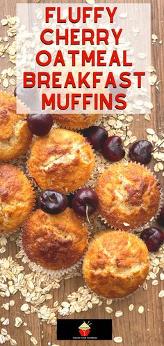 muffins with oatmeal and cherries in the middle on a wooden table