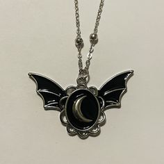 Bat Winged Enamel Moon Cameo Necklace Listing for 1 necklace Vintage Halloween Pendant Jewelry, Black Crescent Metal Necklace, Black Metal Crescent Necklace, Black Enamel Metal Necklaces, Black Halloween Jewelry With Charms, Halloween Black Jewelry With Charms, Black Enamel Metal Necklace, Halloween Pendant Necklaces With Adjustable Chain, Halloween Moon Charm Jewelry As Gift