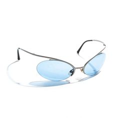 Chanel by Karl Lagerfeld blue lens silver sunglasses, ss 2000 For Sale at 1stDibs Cyberpunk Accessories, Y2k Aesthetic Institute, Futuristic Sunglasses, Silver Sunglasses, Blue Sunglasses, Stylish Glasses, Chanel Sunglasses, Blue Lenses, Y2k Aesthetic