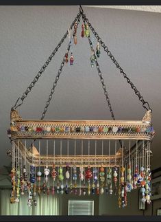 a chandelier hanging from the ceiling in a living room