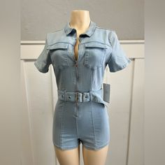 Light Blue Denim Romper Stretchy Trendy Blue Denim Jumpsuit For Day Out, Trendy Blue Stretch Denim Jumpsuit, Trendy Stretch Blue Denim Jumpsuit, Trendy Washed Blue Denim Jumpsuit For Day Out, Light Blue Trendy Denim Jumpsuit For Spring, Light Blue Denim Jumpsuit For Spring, Light Blue Fitted Denim Jumpsuit Casual Style, Spring Stretch Denim Jumpsuit In Medium Wash, Stretch Blue Denim Jumpsuit