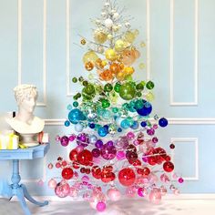 a christmas tree made out of glass balls