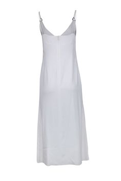 Indulge in effortless elegance with the Dion Lee’s slip dress. Its captivating allure combines summer whites and a timeless silhouette, making it the perfect ensemble for a romantic vacation dinner. With its graceful lines hugging your curves and a hint of playful allure in each step, this dress speaks for itself, all you need is simple jewelry and sandal heels! Size 4 Shell 76% Acetate, 21% Viscose, 3% Elastane Lining 100% Polyester Invisible zipper back Strappy sleeveless detail with triangle Vacation Dinner, Romantic Vacations, Sandal Heels, Dion Lee, Effortless Elegance, Simple Jewelry, White Summer, Invisible Zipper, A Romantic