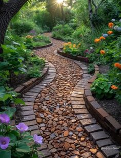 a stone path in the middle of a garden