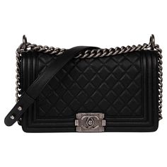 "Chanel Black Quilted Caviar Leather Medium Le Boy Product Details Xupes Ref: CB1293 Brand: Chanel Model: Medium Le Boy Type: Shoulder, Crossbody Serial Number: 23136951 Age: 2017 RRP: £5,800 Accompanied By: Chanel Dust Bag, Box, Authenticity Card, Care Booklet, Ribbon, Protective Felt, Invoice Colour: Black Hardware: Antiqued Silver Material(s): Caviar Leather Specification Height: 16cm Width: 25.5cm Depth: 9cm Strap Drop: Single: 54cm Double: 30cm Interior: Black Textile Closure: S Lock Country of Origin: France Authenticity Details: Authenticity Card, Serial Sticker Condition Condition Rating: Excellent Exterior Condition: The exterior is in excellent condition with minimal signs of use. Interior Condition: The interior is in excellent condition with minimal signs of use. Hardware Condi Chanel Boy Bag Black, Chanel Crossbody, Oversized Bag, Gold Chanel, Chanel Shoulder Bag, Small Boy, Stylish Shoulder Bag, Chanel Model, Heart Bag