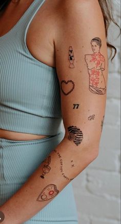 a woman with tattoos on her arm