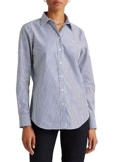 Treated with a no-iron finish, this striped shirt adorned with LRL embroidery is a timeless wardrobe essential. Relaxed fit Intended to hit at the hip Size medium has a 27.5 in body length and a 32.5 in sleeve length Sleeve length is taken from the center back of the neck and changes 0.75 in between sizes Point collar Buttoned placket with signature "Lauren Ralph Lauren"-engraved buttons Long sleeves with buttoned barrel cuffs Signature "LRL" embroidery at the left chest Back yoke Shirttail hem Ralph Lauren Womens, Striped Shirt, Lauren Ralph Lauren, Shirt Online, Womens Clothing Tops, Wardrobe Essentials, Cotton Shirt, Timeless Fashion, Barrel