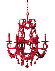 a red chandelier hanging from a ceiling