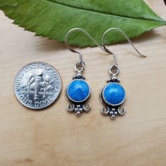 Visit our on-line shop at: Etsy.com/shop/AlbuquerqueDesigns *sterling silver earrings *dangles / drops *southwestern jewelry *blue denim / blue stone *calibrated pre-cut stone: 8mm round shape *classic stone settings *all jewelry items are made to ship, slight variations in stones will occur comparing to pictures *size of a penny is 19mm or a dime is 18mm dime for comparing size with jewelry item *handcrafted in Albuquerque, New Mexico, USA *free convenient gift box *free shipping in USA *seller Everyday Earrings Studs, Denim Jewelry, New Mexico Usa, Minimalist Earrings Studs, Minimalist Studs, Jewelry Blue, Southwestern Jewelry, Coral Jewelry, Silver Dangle Earrings