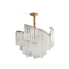 a glass chandelier hanging from a gold ceiling fixture on an isolated white background