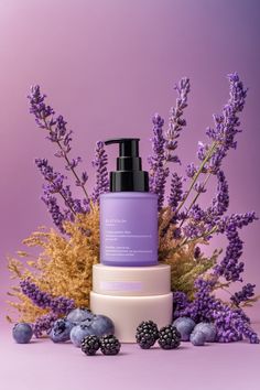 Purple skincare products displayed with fresh lavender, blackberries, and blueberries on a soft pink background. Perfect for skincare branding and product mockup inspiration. #SkincareInspiration #ProductPhotography #PurpleAesthetics #BeautyProducts Purple Products Aesthetic, Magical Product Photography, Lavender Product Photography, Cosmetics Photography Creative, Purple Product Photography, Cosmetic Photoshoot Ideas, Cosmetic Graphic Design, Purple Cosmetics, Purple Skincare