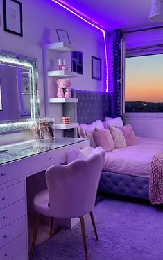 a bedroom with purple lighting and a large window