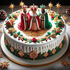 a cake decorated with christmas decorations and figurines