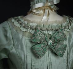 Green Vintage Dress With Historical Design, Vintage Green Dress With Historical Design, Elegant Baroque Costume Dresses, Elegant Fitted Victorian Dress In Baroque Style, Rococo Victorian Wedding Dress, Historical Design Vintage Dress For Costume, Rococo Victorian Dress For Vintage Events, Elegant Victorian Dress With Ruffles And Baroque Shape, Victorian Baroque Wedding Dress