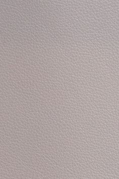 a white leather textured surface with no visible lines or dots on the top and bottom