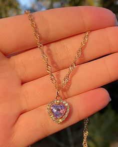 "The cutest little heart charm necklace in a baby pastel purple 𝓓𝓔𝓣𝓐𝓘𝓛𝓢 ♡ 16-18 inch adjustable ♡ 0.5\" cubic zirconium charm ♡ 18k triple gold electroplated chain + color retention ♡ hypoallergenic This necklace makes the perfect gift for yourself or a loved one! 𝓒𝓐𝓡𝓔 𝓘𝓝𝓢𝓣𝓡𝓤𝓒𝓣𝓘𝓞𝓝𝓢 ♡ - Keep your jewelry in a cool, dry environment to ensure the longevity of the product. Plated jewelry can last years with proper care! - Avoid contact with oils, perfumes and other chemicals - Jewelry Y2k, Diamond Heart Necklace, Heart Charm Necklace, Purple Diamond, Heart Necklace Diamond, Purple Jewelry, Jewelry Accessories Ideas, Dope Jewelry, Girly Accessories