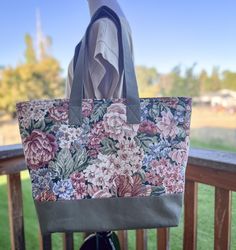 "Becky's Handmade tote is a nice large size featuring and beautiful floral print. Neatly lined. Use for a travel tote, book bag, reusable bag, and much more.   Size: Length- 15\" Height- 16\"" Floral Print Canvas Tote Bag For Daily Use, Floral Print Canvas Tote Bag For Everyday Use, Floral Print Canvas Tote Shoulder Bag, Everyday Floral Print Canvas Tote Bag, Rectangular Floral Canvas Bag For Everyday Use, Everyday Rectangular Floral Print Canvas Bag, Rectangular Canvas Bag With Floral Print, Floral Print Rectangular Canvas Bag, Everyday Green Shoulder Bag With Floral Print