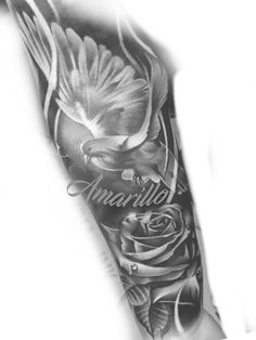 a black and white photo of a bird with roses on it's arm that says amarillo