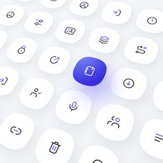 an image of a keyboard with many different symbols on the keypad and in the background there is a blue button