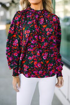 We can't change this blouse nor would we want to! It's gorgeous! That floral print is so vibrant and feminine! This blouse also has a very classic fit that we can't get over! You are going to love wearing this beauty for a day at work or for grabbing lunch with a friend! Ruffled round neckline Button keyhole back Long bubble sleeves with smocked cuffs Ditsy floral print No stretch Baileigh is wearing the small. Patterned Blouse With Bold Print For Spring, Chic Blouse With Bold Print, Patterned Blouse With Bold Print, Multicolor Feminine Blouse With Ditsy Floral Print, Chic Floral Print Patterned Blouse, Chic Patterned Floral Print Blouse, Chic Floral Print Tops For Fall, Fitted Blouse With Ditsy Floral Print For Fall, Fall Multicolor Floral Print Tops