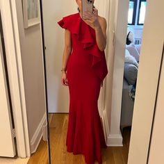 Red One Shoulder Gown With Ruffle. 98% Poly, 2% Spandex. Worn 1x To A Black Tie Charity And 1x To A Marine Corps Ball. Heavy Fabric And Lined - Perfect For Formal Winter Or Fall Events. Image Looks Stained But It’s Water From My Steamer When I Was Preparing For The Photos - It’s In Perfect Condition. 57inches From Shoulder To Hem. Red Stretch Evening Dress For Gala, One-shoulder Fitted Evening Dress For Red Carpet, Fitted One-shoulder Evening Dress For Red Carpet, Elegant Red Stretch Evening Dress, Chic Red Evening Gown, Red Stretch Evening Dress For Formal Occasions, Red Stretch Evening Dress For Prom, Red Stretch Evening Dress, Red Fitted One-shoulder Gown