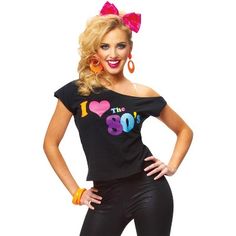 a woman in black shirt and leggings with pink bow on her head posing for the camera