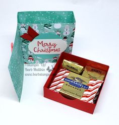 two christmas candy bars in a gift box