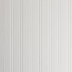 a white wall with vertical stripes on it