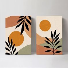 two canvases with plants on them against a white wall, one is orange and the other is green