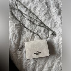 Mini Coach Wallet Chic White Wallet On Chain For Everyday, Coach Rectangular Wallet On Chain For Everyday Use, Everyday Rectangular Wallet With Chain Strap, Chic Wallet With Chain Strap As Gift, Rectangular Wallets With Chain Strap As Gift, Chic Wallet With Chain Strap For Gift, Chic Wallets With Chain Strap For Gift, Rectangular Wallet On Chain Gift, Coach Wallets With Chain Strap For Everyday Use