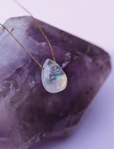 This luminescent Rainbow Moonstone necklace is infused with love and is a touchstone of comfort, celebration, empathy, forgiveness, humor, affection, generosity and love—perfect for sisters. 9 x 12 millimeter faceted gemstone (There is a variance in color and flare among Moonstones due to how they are formed. Many include small black inclusions, which is not a defect but part of the natural stone.) 16" long with a sterling silver extender allowing it to be worn up to 18" Sterling silver lobster Infused With Love, Rainbow Moonstone Necklace, Moonstone Necklace, Faceted Gemstones, Precious Gemstones, Moon Stone, Rainbow Moonstone, Natural Stone, Moonstone