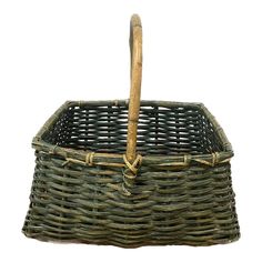 a wicker basket with a wooden handle