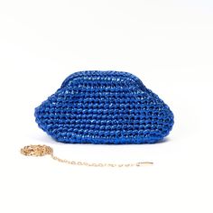 Meet our metallic blue clutch bag, its hand crochet with leather effect yarn. We specially designed it to accompany you for your special events and also make your day special 🤩 It is a perfect gift idea for women ! > It is exclusively hand crochet > It is made of ecologically colored metallic polyester yarn > It has a special metal bourse mechanism for an easy closing and stylish look. > You can choose to use it as a clutch or a crossbody bag with a metal chain strap. > Measurements are: W : 25 Blue Handmade Evening Bag For Everyday Use, Chic Blue Bag For Gift, Trendy Blue Evening Bag For Party, Chic Blue Shoulder Bag For Gift, Chic Blue Shoulder Bag Gift, Trendy Blue Evening Clutch, Handmade Blue Party Bag, Handmade Blue Party Bags, Handmade Blue Clutch For Evening