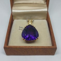 Band : Goldsmith Jewellers Material : 925 Sterling Silver Gemstone : Natural Amethyst   Amethyst Stone Weight : 27.50 Carat Amethyst Stone Size : 20 x 20.50 mm Gross Weight : 8.490 Gm Around... Stone Shape : Pear Pendant Color : Yellow Made to Order Please Give Your Opinion or Feedback About The Product https://www.etsy.com/in-en/your/shops/GoldsmithJewellers/onboarding/listings/create Teardrop Tanzanite Jewelry For Anniversary, Tanzanite Gemstones As A Gift, Amethyst Birthstone Jewelry For Formal Occasions, Yellow Gold Pear-shaped Amethyst Jewelry, Pear-shaped Amethyst Jewelry In Yellow Gold, Formal Amethyst Birthstone Jewelry, Luxury Pear-shaped Gemstones For Gift, Purple Teardrop Pendant Jewelry For Anniversary, Formal Teardrop Amethyst Jewelry