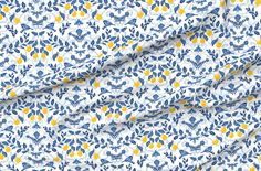 a blue and yellow floral print fabric