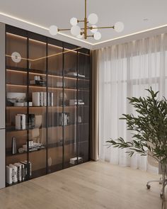 a living room filled with lots of furniture and bookshelves next to a window