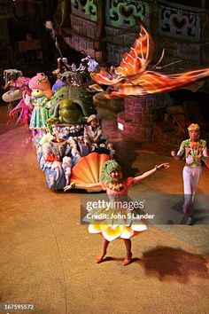 performers perform on stage during the opening ceremony for disney's live - in - the - park