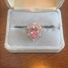 Size 7. Never Worn. Pink Teardrop Jewelry With Center Stone, Pink Teardrop Jewelry With Halo Setting, Pink Teardrop Halo Setting Ring, Rose Gold Teardrop Jewelry With Center Stone, Elegant Pink Teardrop Ring, Pear-shaped Vs Clarity Jewelry Gift, 7 Rings, Ring Color, Pink Stone