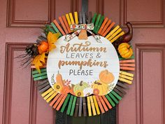 a wreath that says autumn leaves and pumpkins please