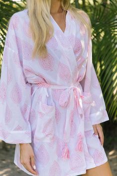 Soft and luxe, wear aprés bubble bath or as a beach coverup. Robes come wrapped in a lovely matching bag, making them the perfect gift or gift to yourself. Tassel detail on belt. One size. Choose long or short length. Feminine Beach Kimono For Summer, White Wrap Robe For Vacation, Chic Pink Beach Kimono, Summer White Kimono For Relaxation, White Feminine Summer Robe, White Summer Kimono For Relaxation, Pink Summer Beach Robe, Spring Beach Robe, Flowy Fit, White Robe With Kimono Sleeves For Beach Cover-up